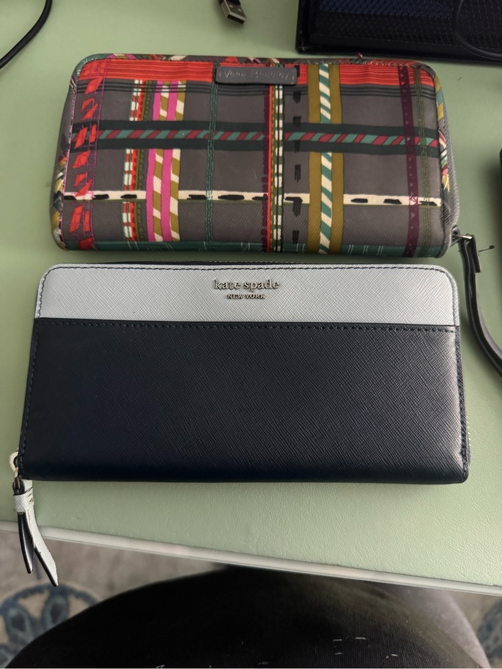 Kate Spade and Vera Bradley zip around wallet duo
